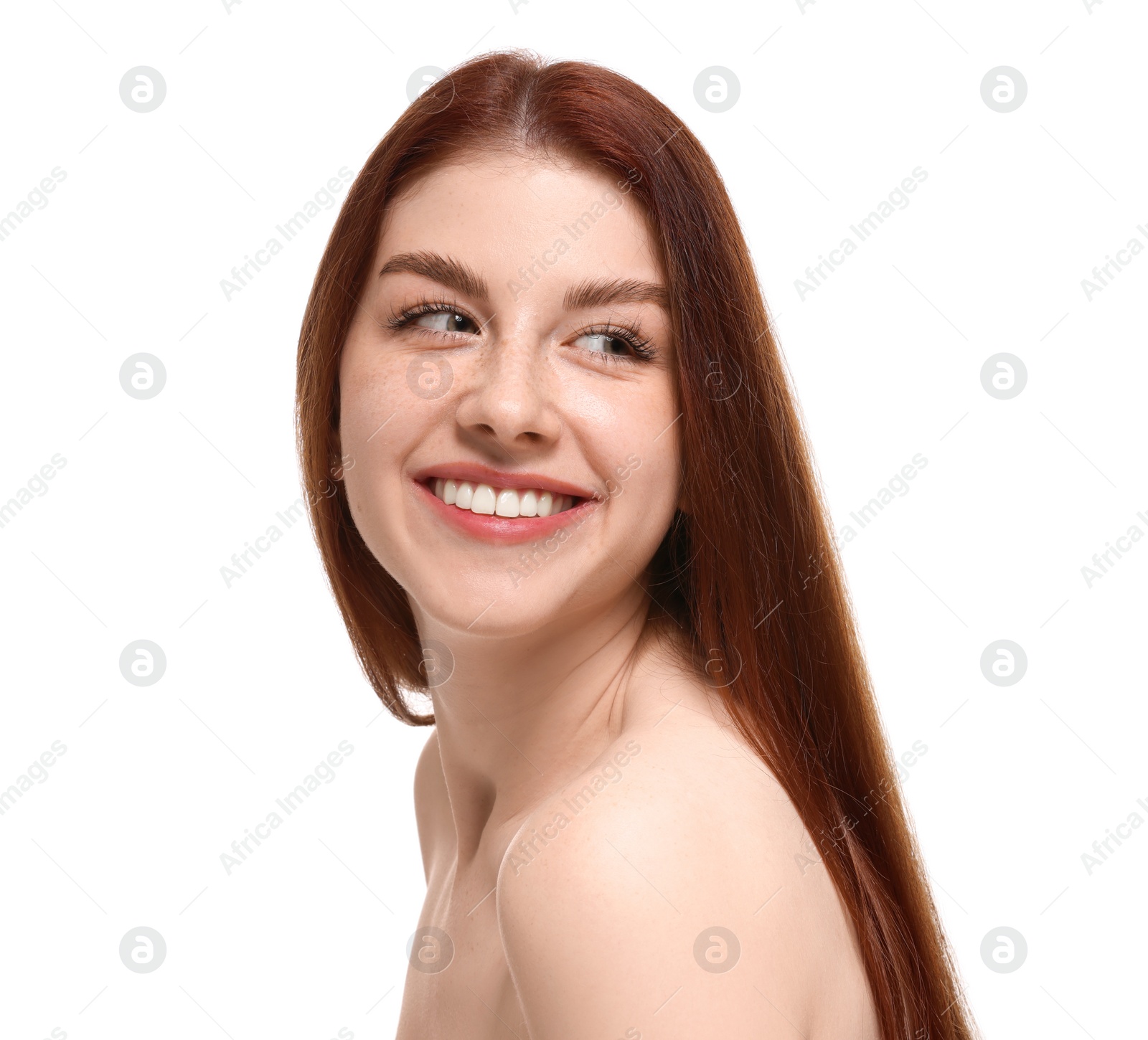 Photo of Portrait of smiling woman with freckles on white background