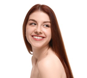 Portrait of smiling woman with freckles on white background