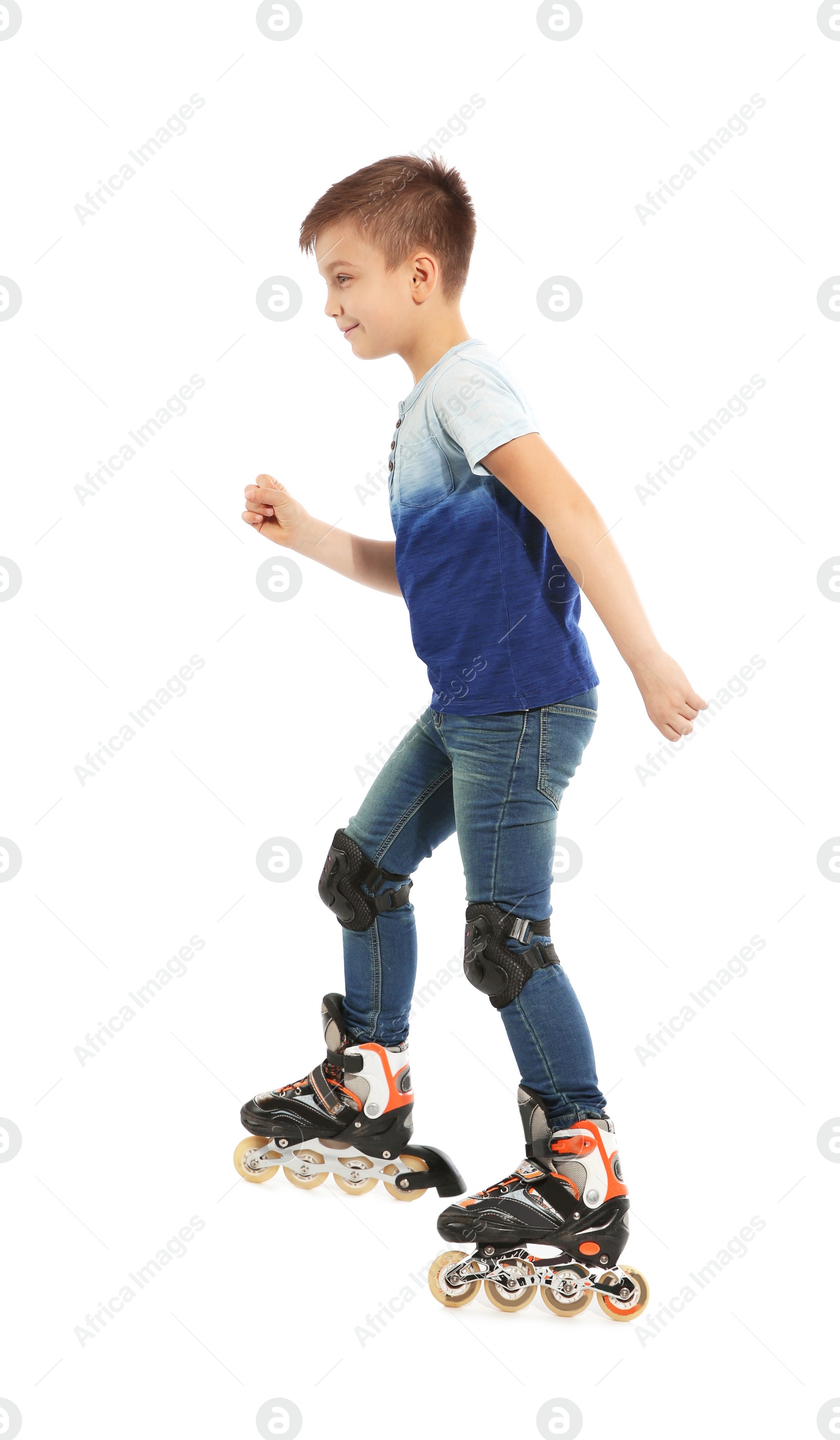 Photo of Little boy with inline roller skates on white background