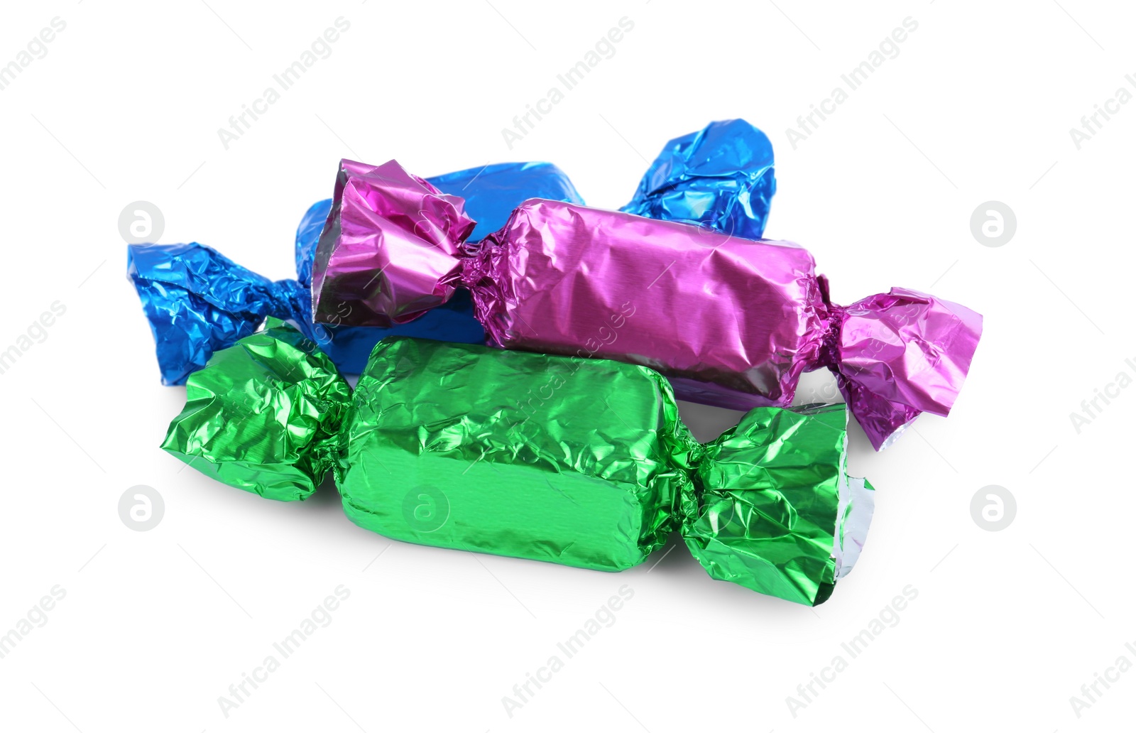 Photo of Tasty candies in colorful wrappers isolated on white