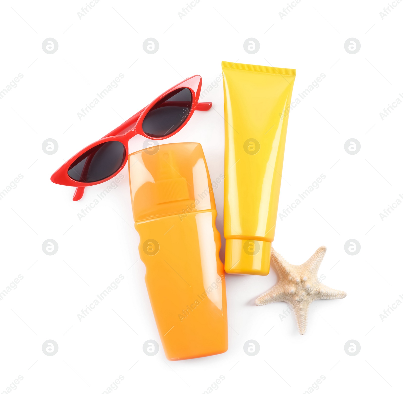 Photo of Sun protection products, sunglasses and starfish on white background, top view. Beach objects