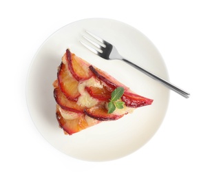 Photo of Slice of delicious cake with plums isolated on white, top view