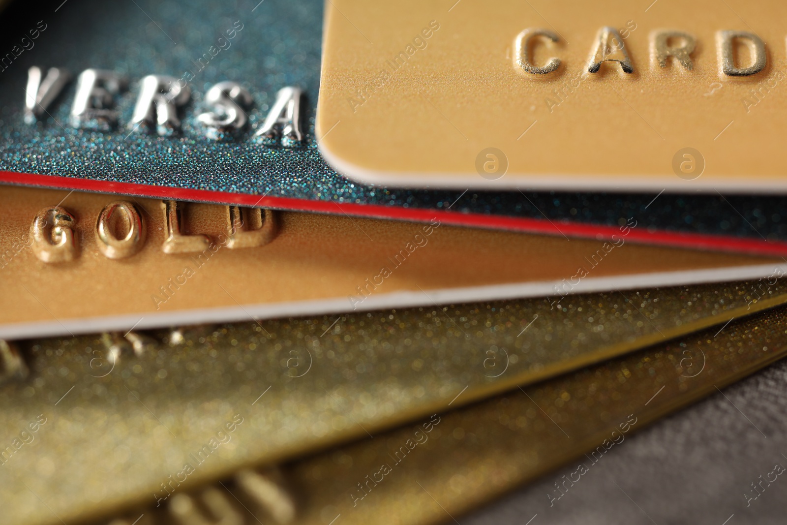 Photo of Plastic credit cards on table, macro view