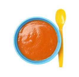 Photo of Delicious baby food in bowl and spoon isolated on white, top view