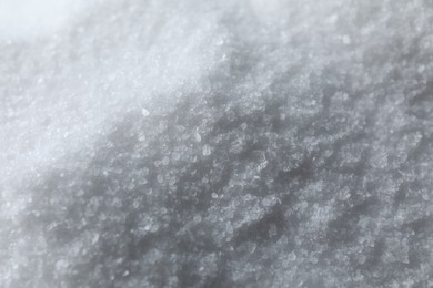 Photo of Organic white sea salt as background, closeup