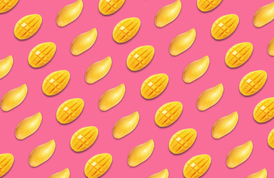 Image of Pattern of cut mango fruits on pink background