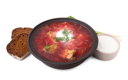 Tasty borscht, sour cream and bread isolated on white