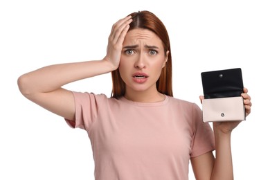 Upset woman with empty wallet on white background