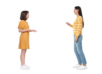 Image of Two women talking on white background. Dialogue