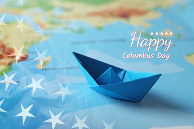 Happy Columbus Day. Light blue paper boat on world map