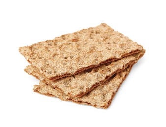 Photo of Many fresh crunchy crispbreads on white background. Healthy snack