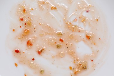 Photo of Smear of sauce on white background, top view