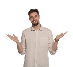 Photo of Handsome young man gesturing on white background