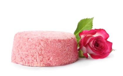 Solid shampoo bar and rose on white background. Hair care
