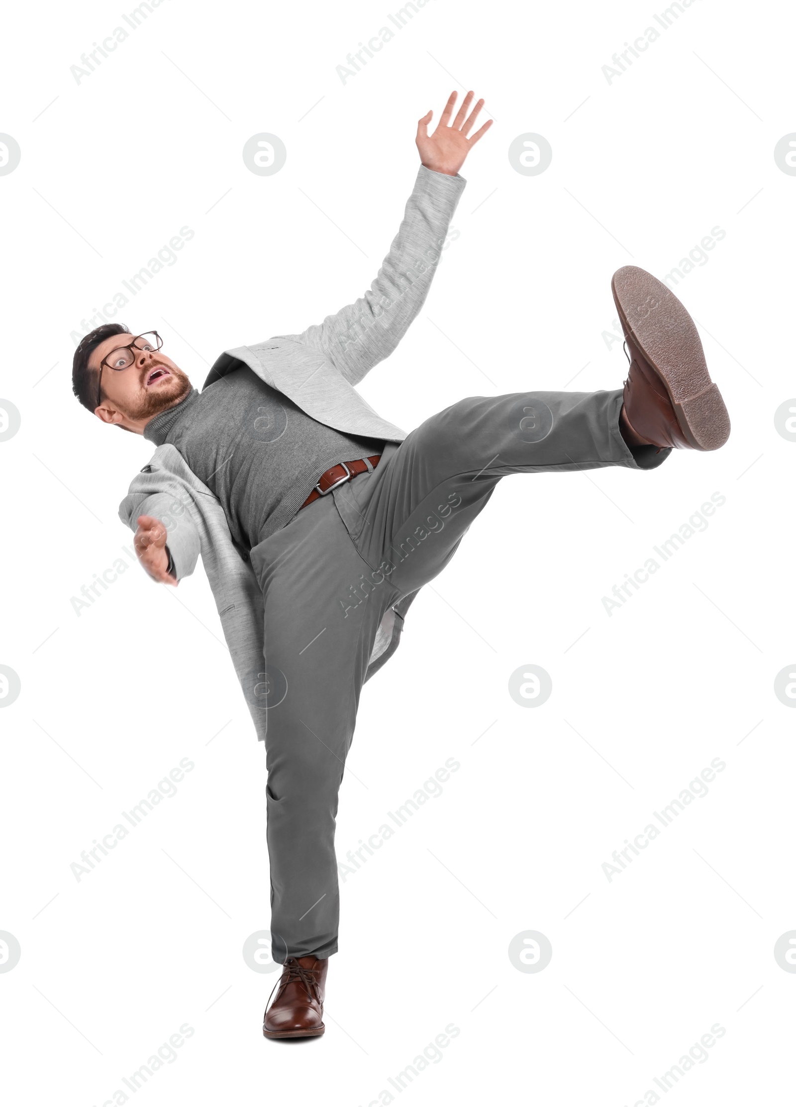 Photo of Handsome bearded businessman falling on white background