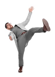 Photo of Handsome bearded businessman falling on white background