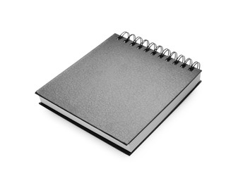 One notebook with black cover isolated on white