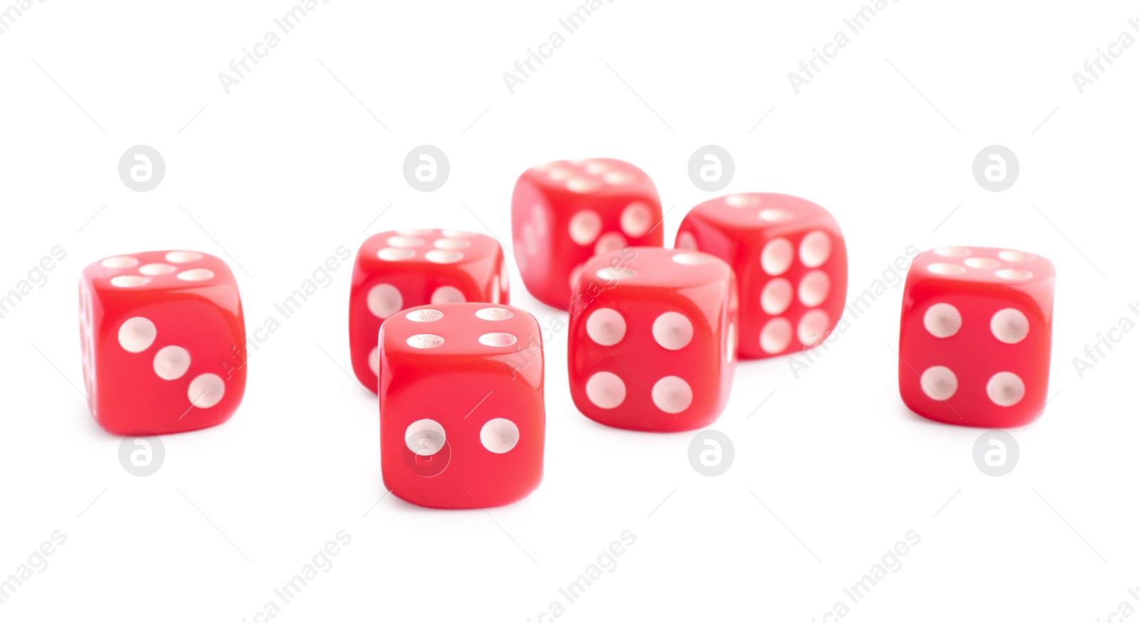 Photo of Many red game dices isolated on white