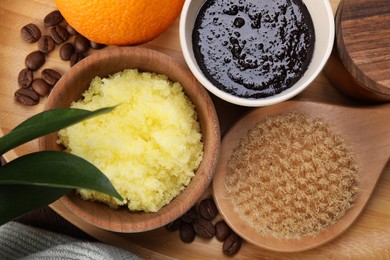 Photo of Flat lay composition with natural body scrubs on table. Anti cellulite treatment