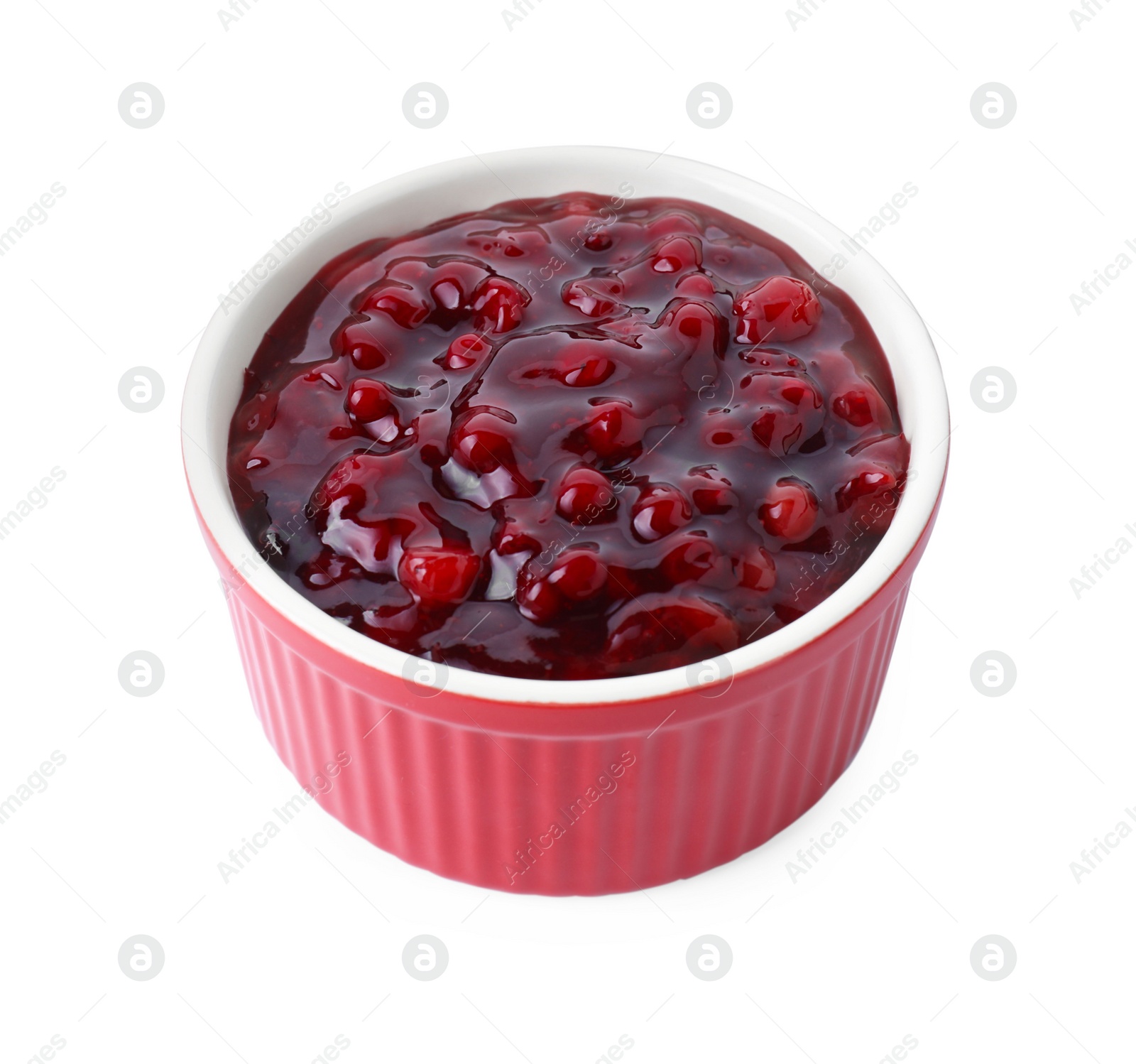 Photo of Fresh cranberry sauce in bowl isolated on white