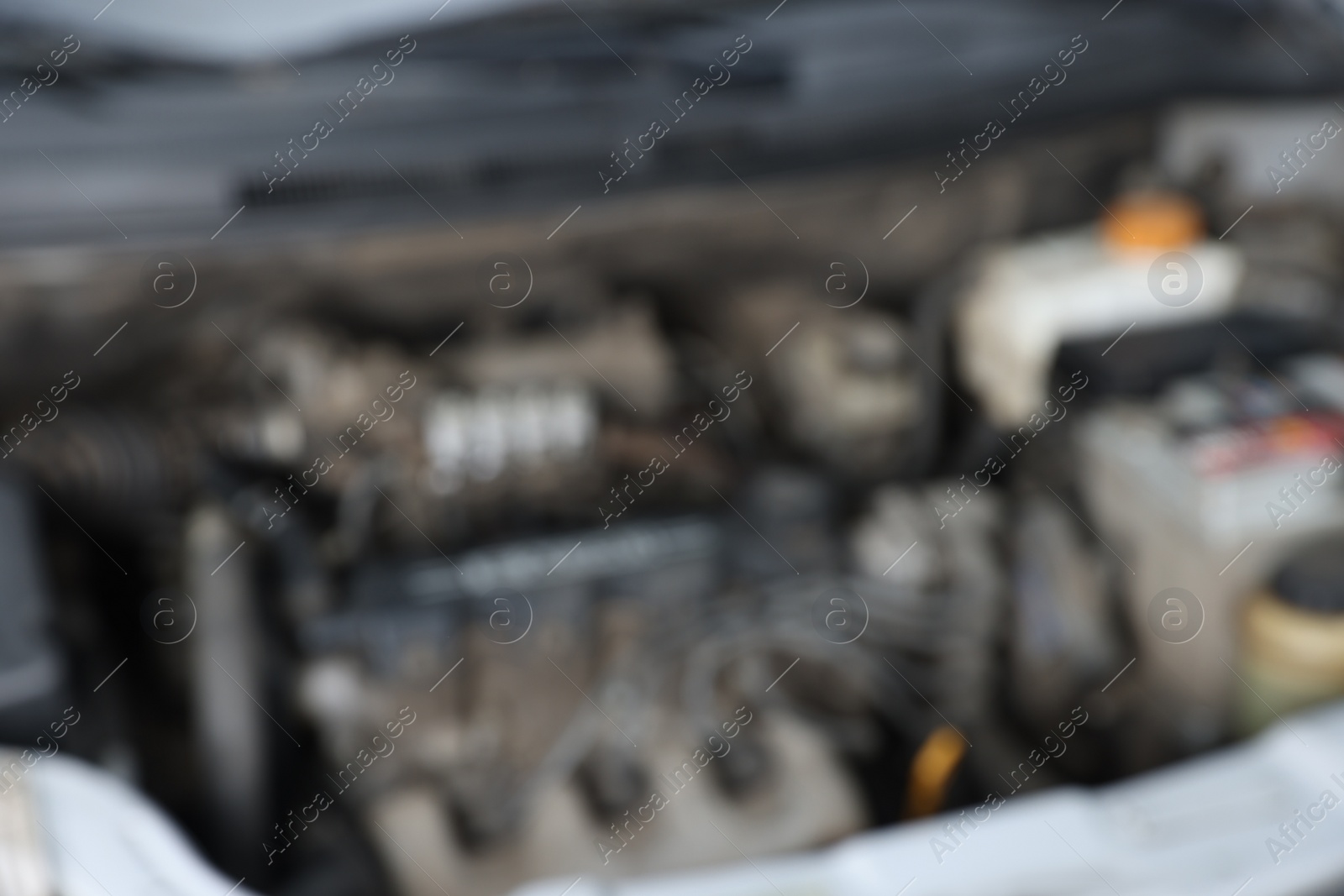 Photo of Blurred view of engine bay in modern car