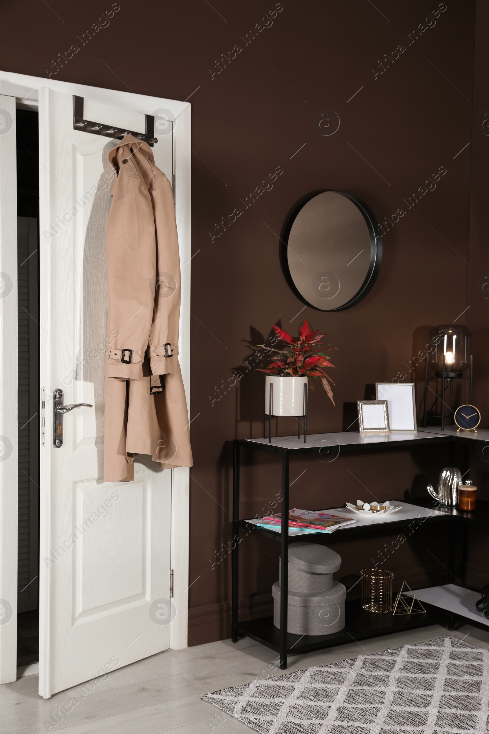 Photo of Hallway interior with console table and stylish decor