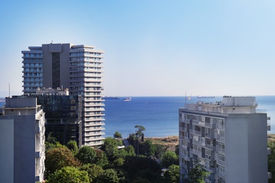 Photo of Picturesque view of city with beautiful buildings near sea