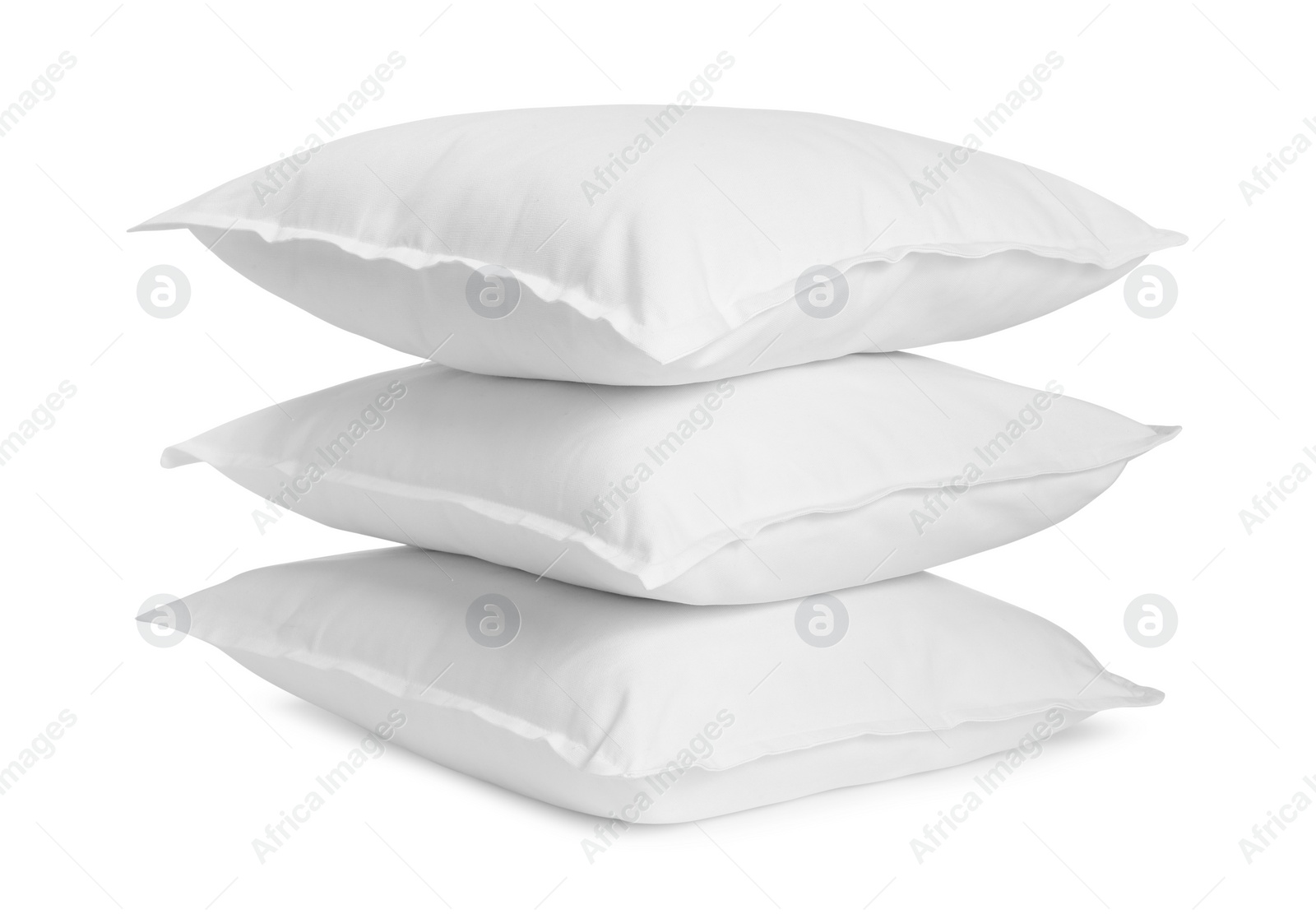 Photo of Three new soft pillows isolated on white