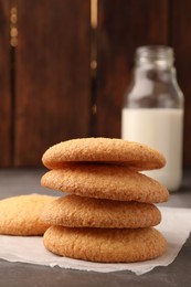 Delicious Danish butter cookies on grey table, closeup