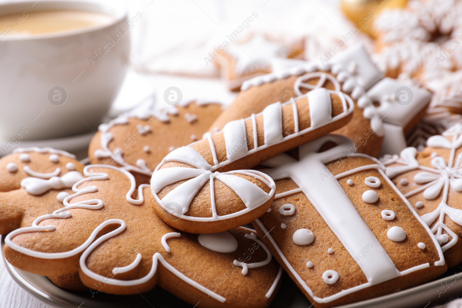 Photo of Delicious Christmas cookies on plate, closeup view