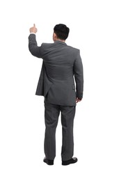 Businessman in suit posing on white background, back view