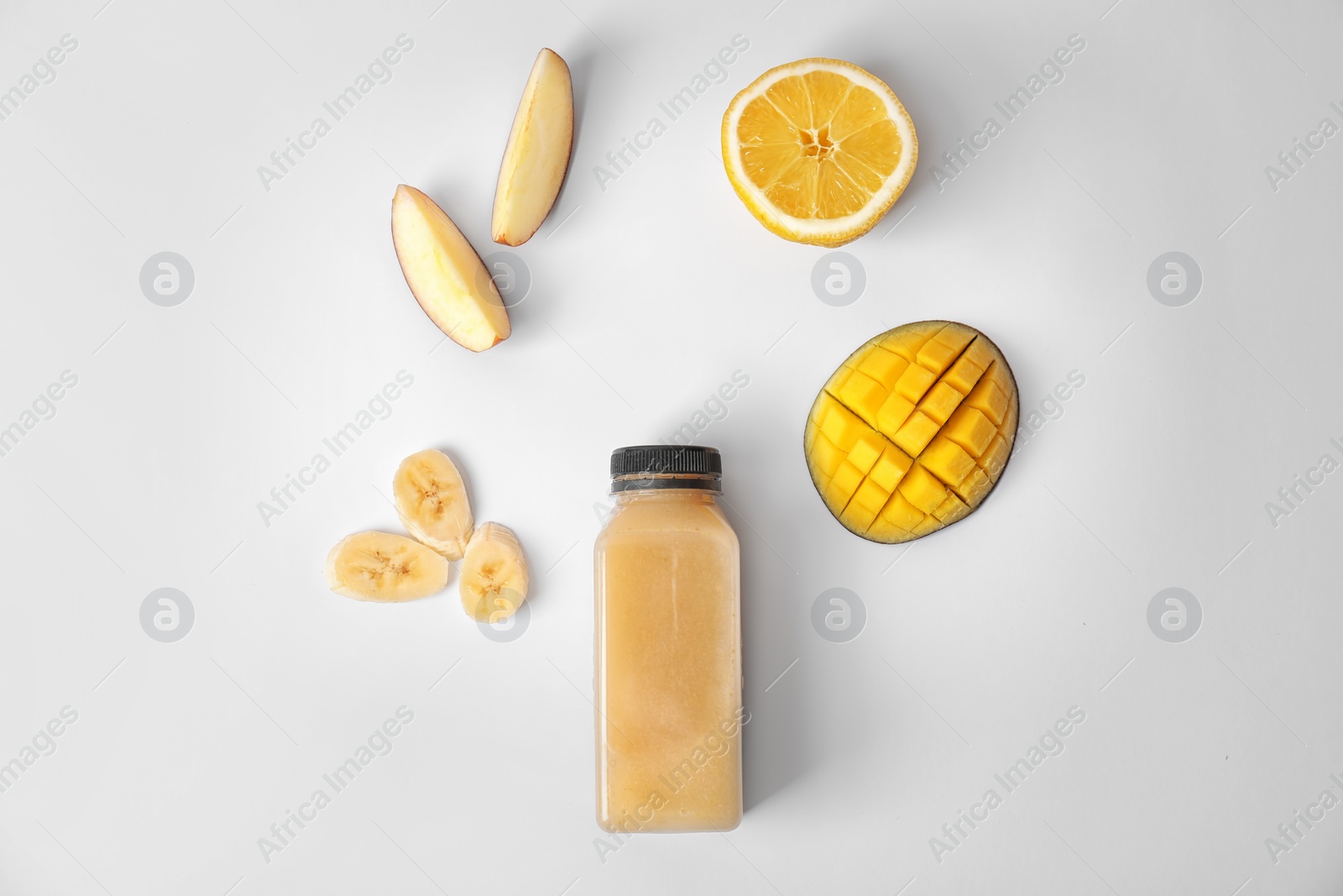 Photo of Flat lay composition with healthy detox smoothie and ingredients on light background