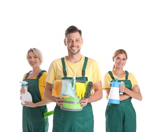 Photo of Team of janitors with cleaning supplies on white background