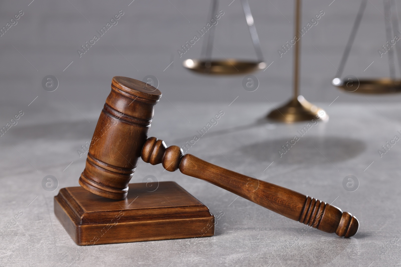 Photo of Law concept. Judge's gavel on light grey table