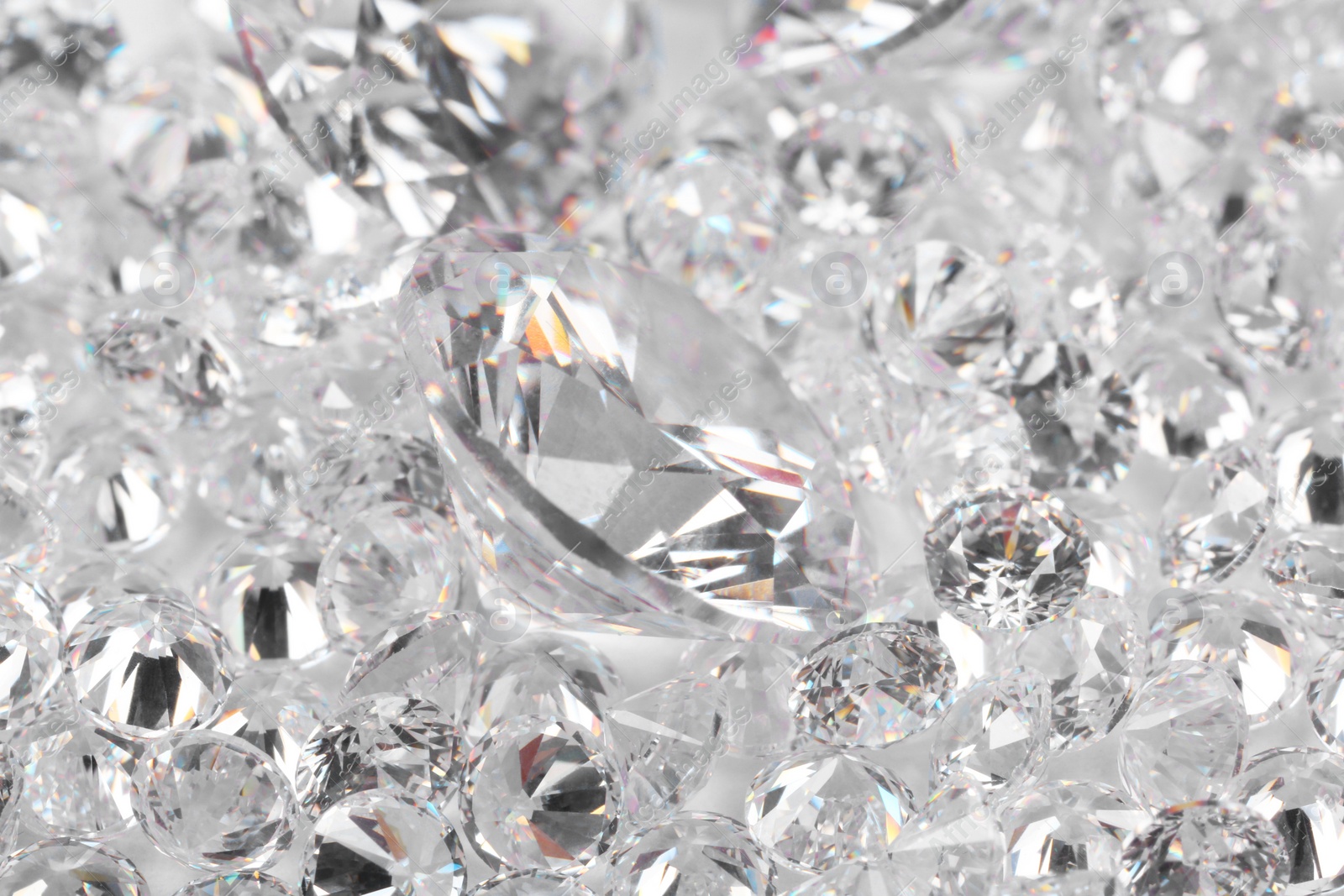 Photo of Many beautiful shiny diamonds as background, closeup