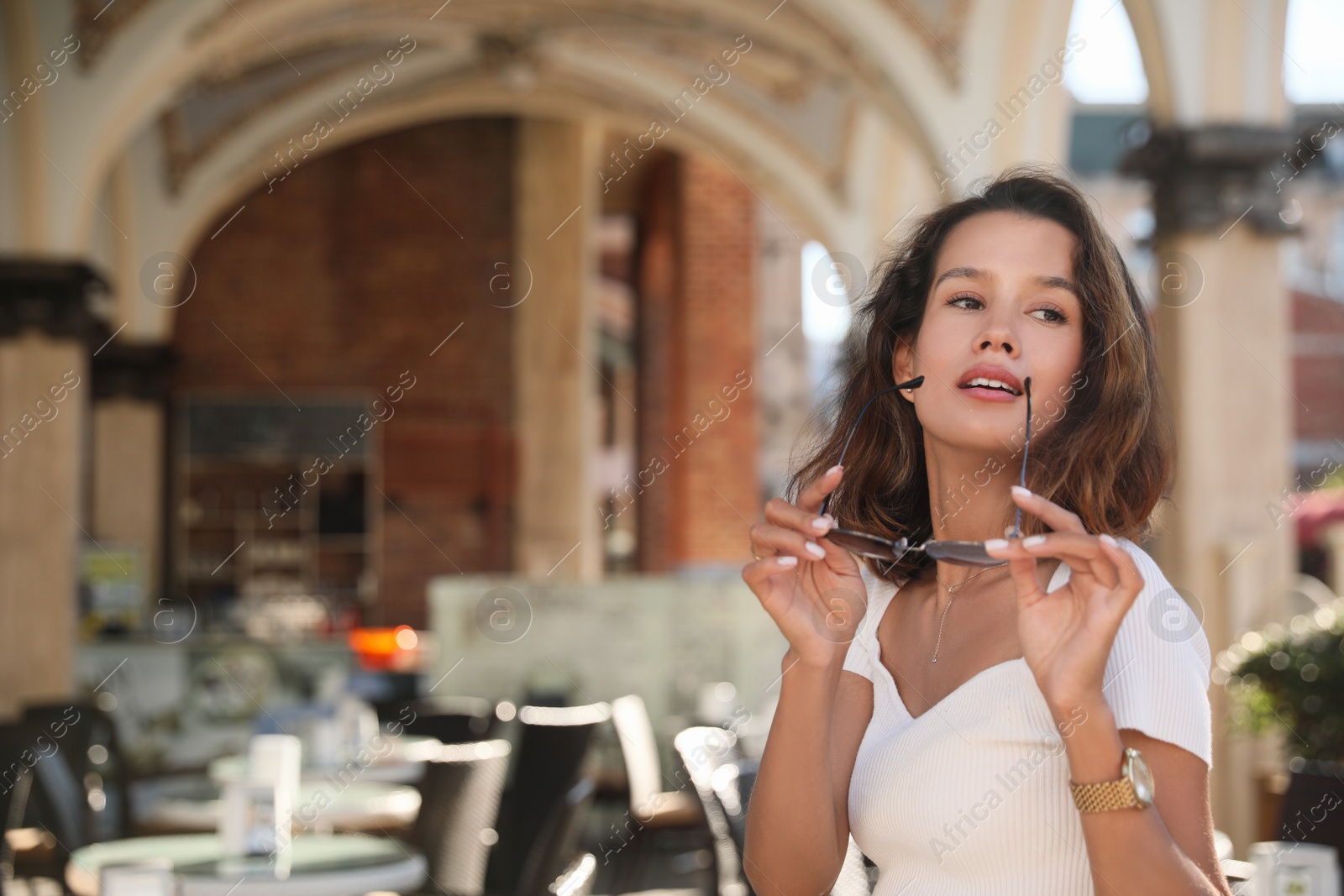 Photo of Portrait of beautiful young woman outdoors on summer day