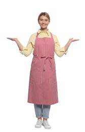 Beautiful young woman in clean striped apron on white background