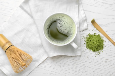 Flat lay composition with matcha tea on light background