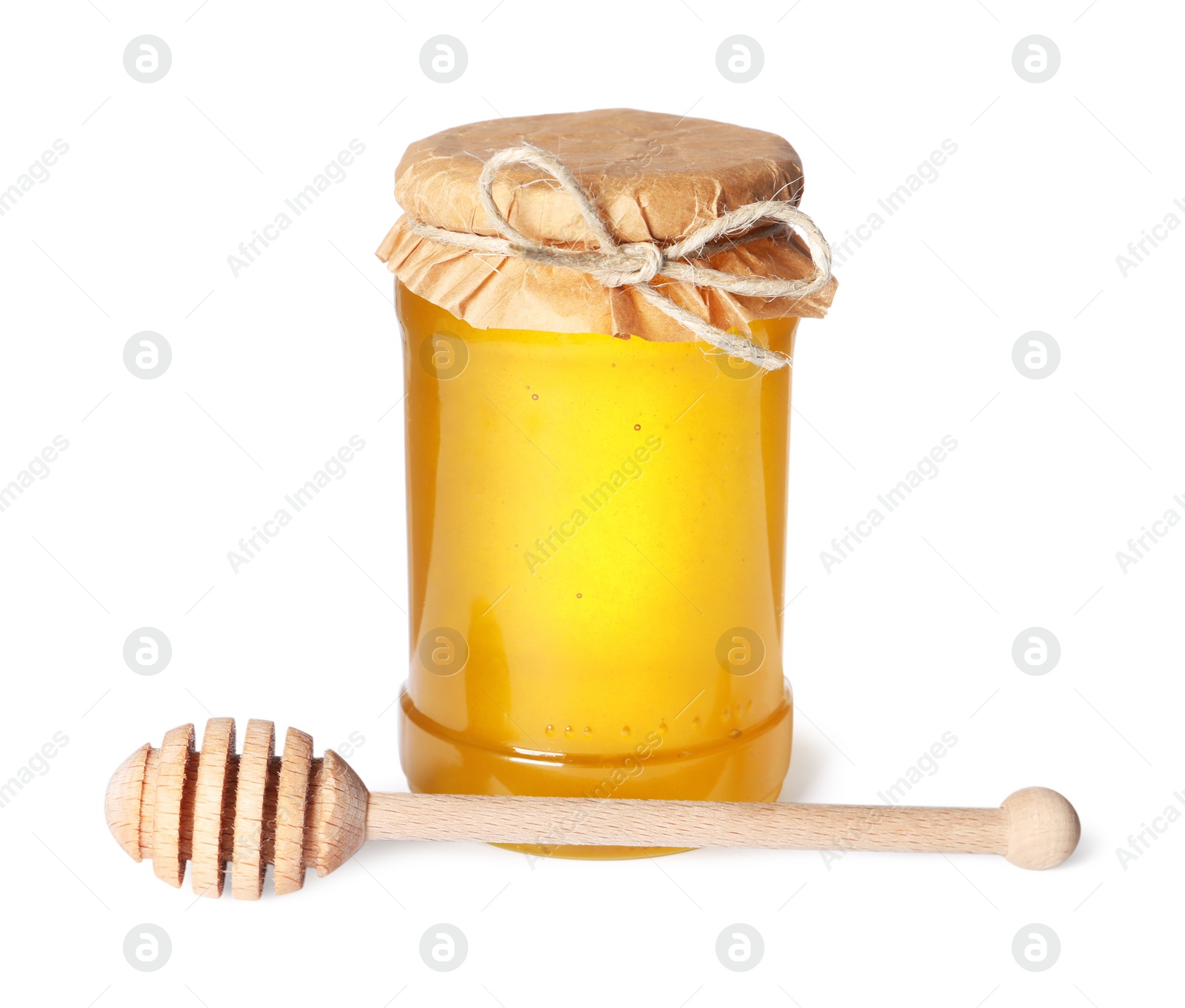 Photo of Tasty natural honey in glass jar and dipper isolated on white