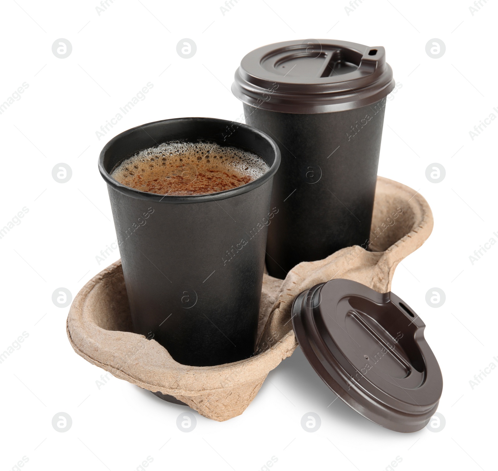 Photo of Takeaway paper cups with coffee in cardboard holder on white background