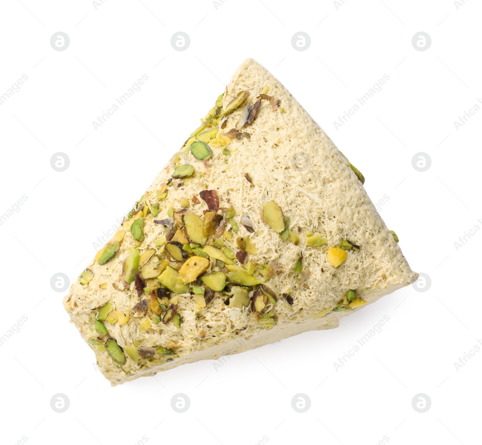 Photo of Piece of tasty halva with pistachios isolated on white, top view