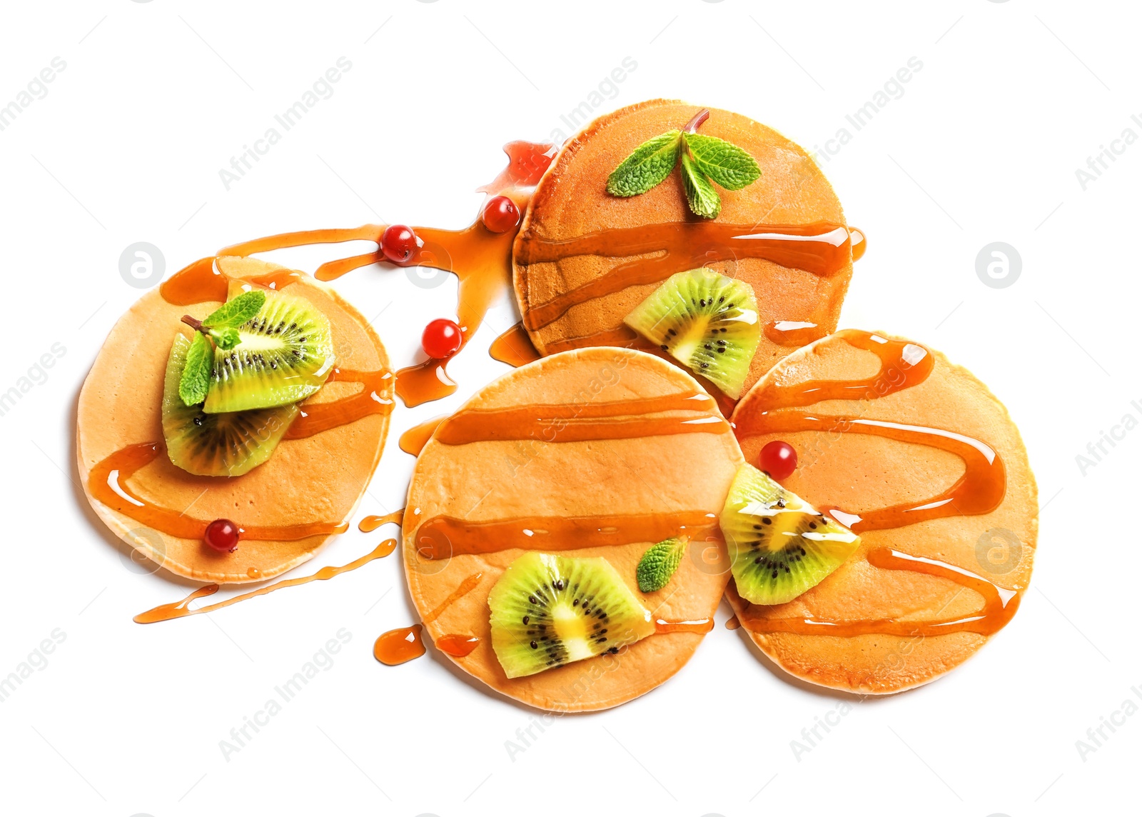 Photo of Tasty pancakes with kiwi and syrup on white background