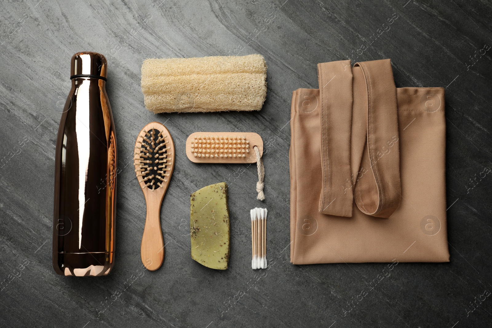 Photo of Flat lay composition with eco friendly products on grey background. Conscious consumption