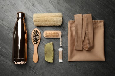 Photo of Flat lay composition with eco friendly products on grey background. Conscious consumption