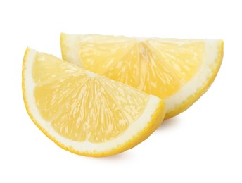 Photo of Pieces of fresh lemon isolated on white