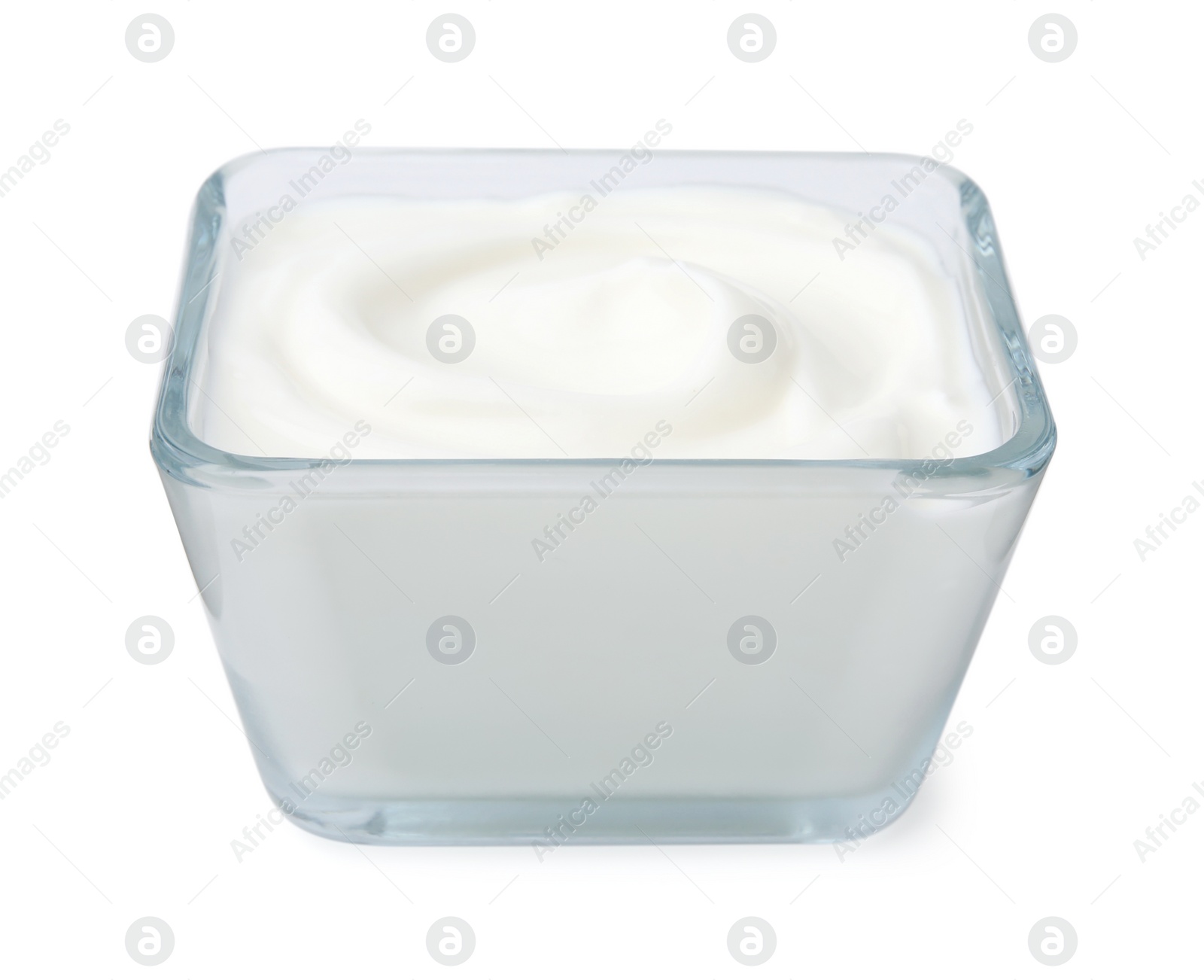 Photo of Delicious natural yogurt in glass bowl isolated on white