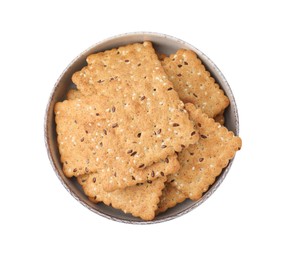 Photo of Cereal crackers with flax and sesame seeds in bowl isolated on white, top view