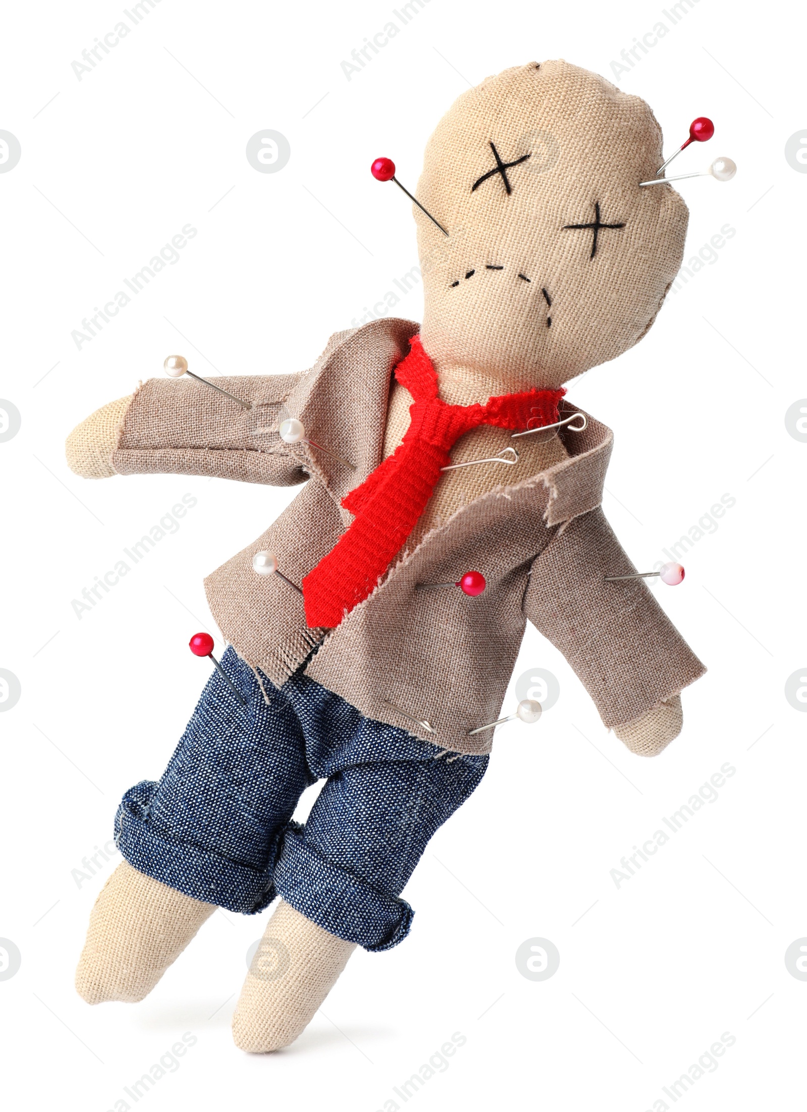 Photo of Voodoo doll dressed as businessman with pins isolated on white