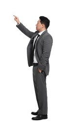 Businessman in suit posing on white background