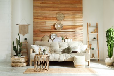 Living room interior with stylish decor and comfortable sofa